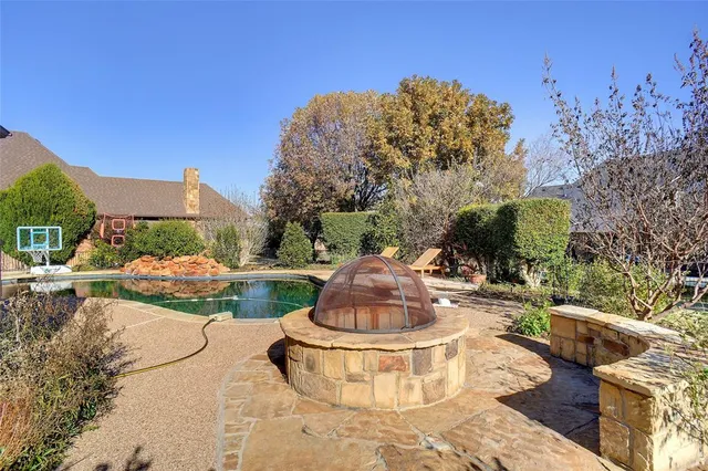 a view of a table and chairs in the patio