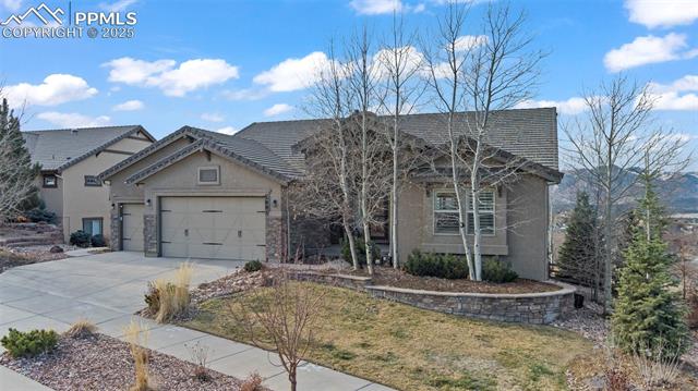 2001 Ripple Ridge Road Colorado Springs, CO 80921 - Photo 2 of 4 View of front facade with a garage