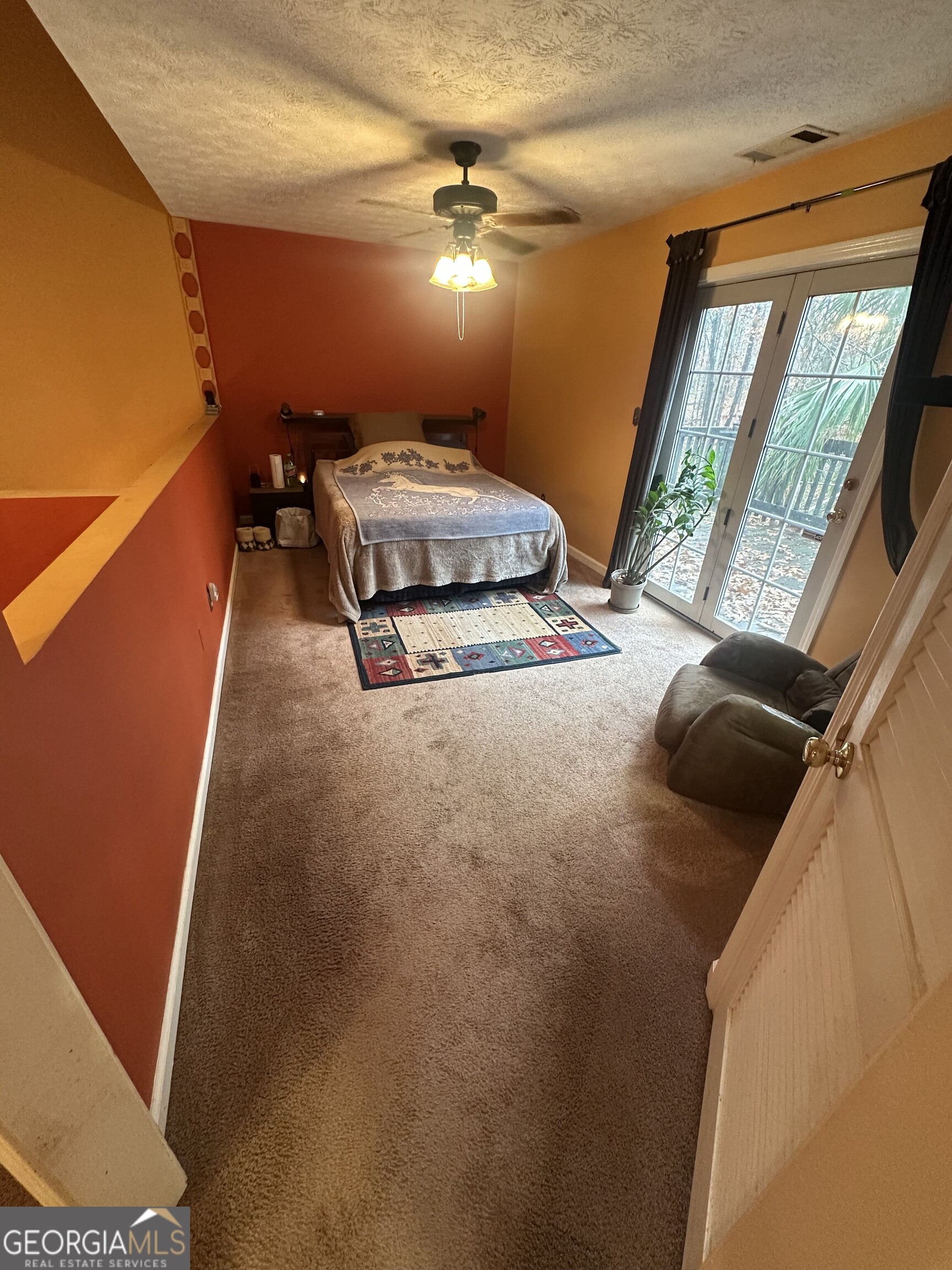 565 Patillo Road Stockbridge, GA 30281 - Photo 11 of 31 a room with furniture and window