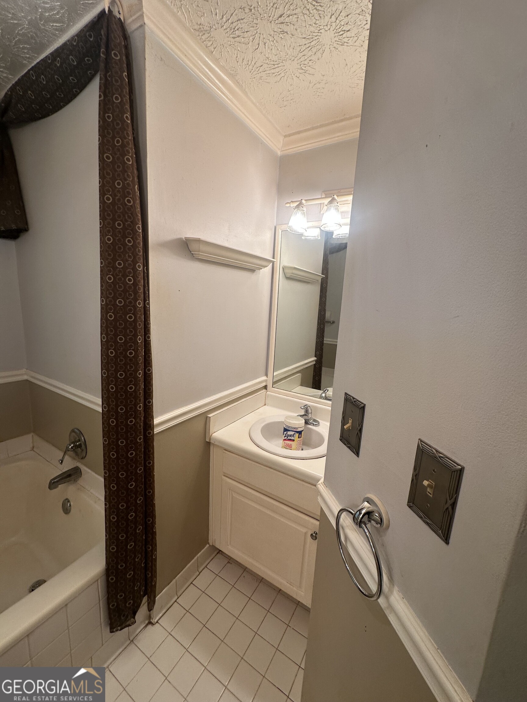 565 Patillo Road Stockbridge, GA 30281 - Photo 21 of 31 a bathroom with a sink toilet and shower
