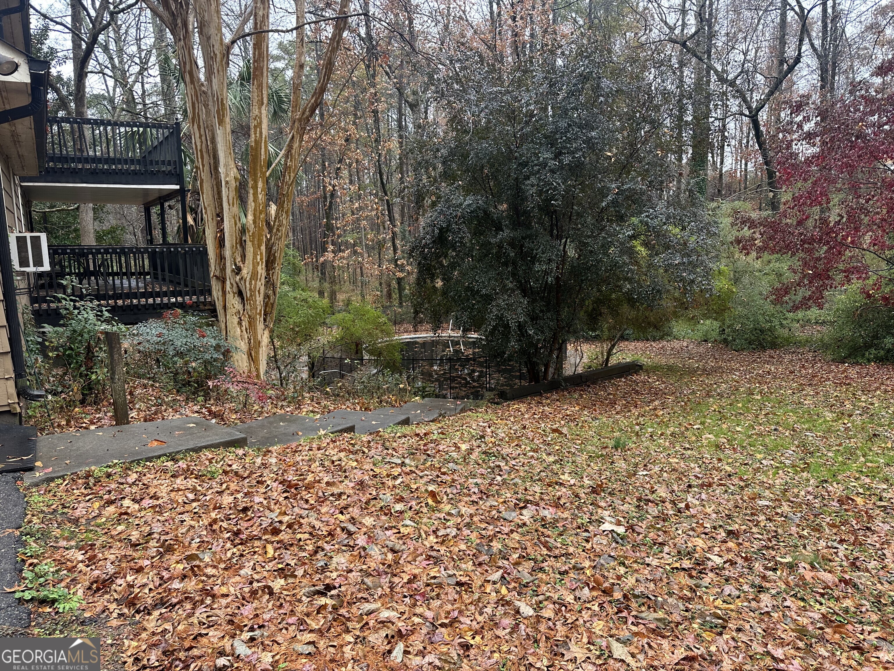 565 Patillo Road Stockbridge, GA 30281 - Photo 30 of 31 a backyard of a house with lots of green space