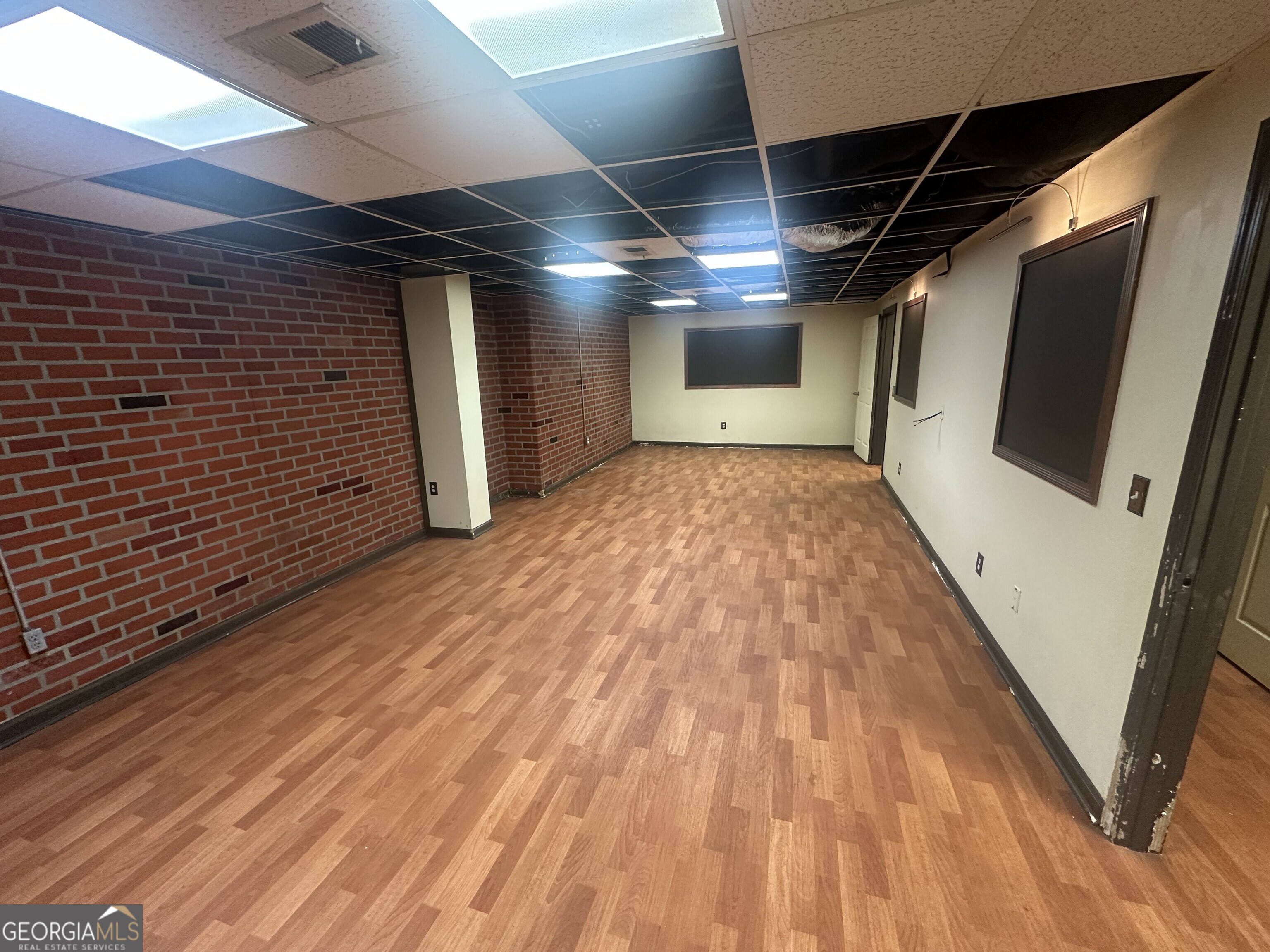 565 Patillo Road Stockbridge, GA 30281 - Photo 6 of 31 a view of empty room with wooden floor