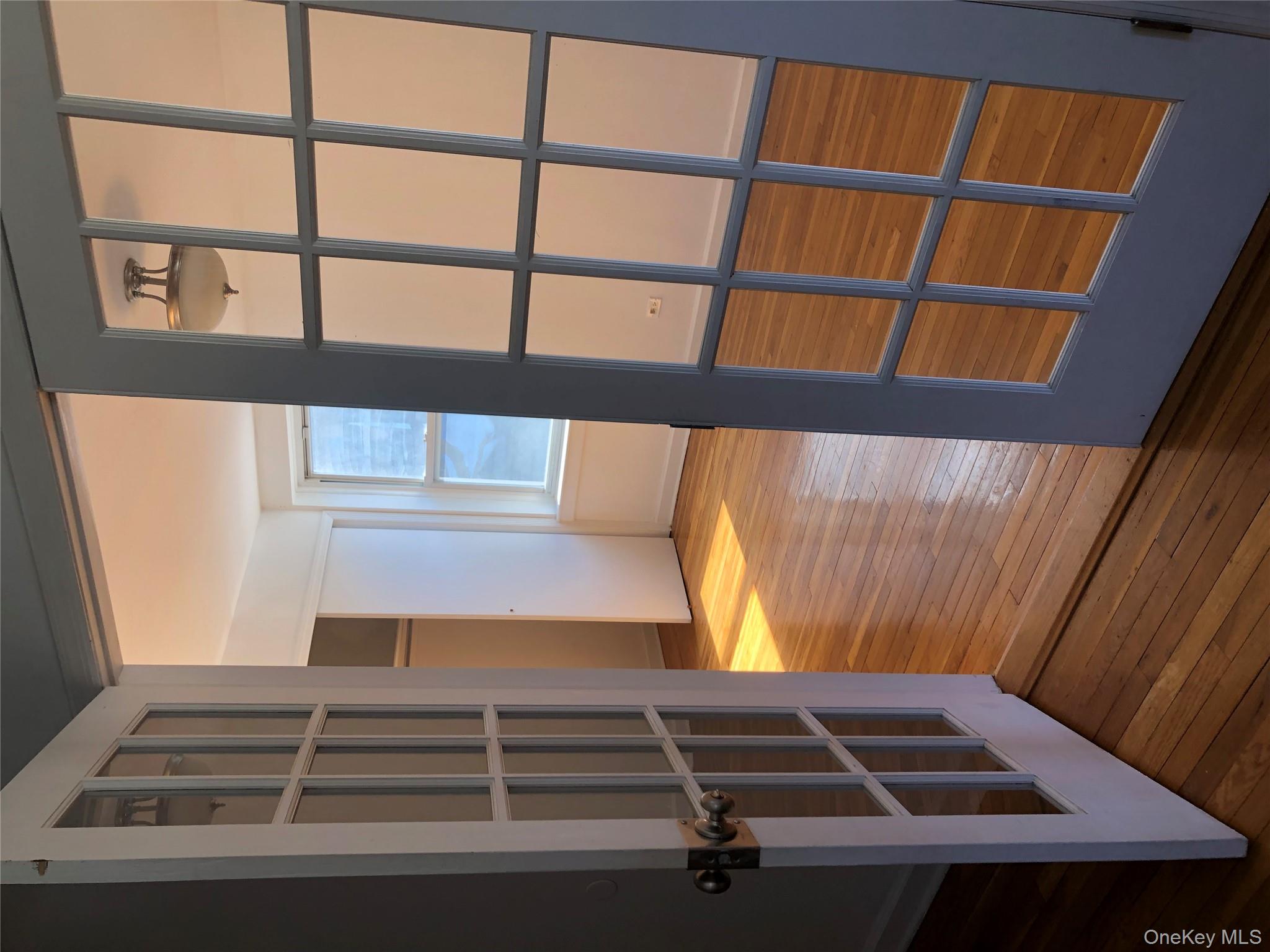 66-33 Yellowstone Boulevard, Unit 2B Queens, NY 11375 - Photo 2 of 13 a view of walk in closet with empty racks