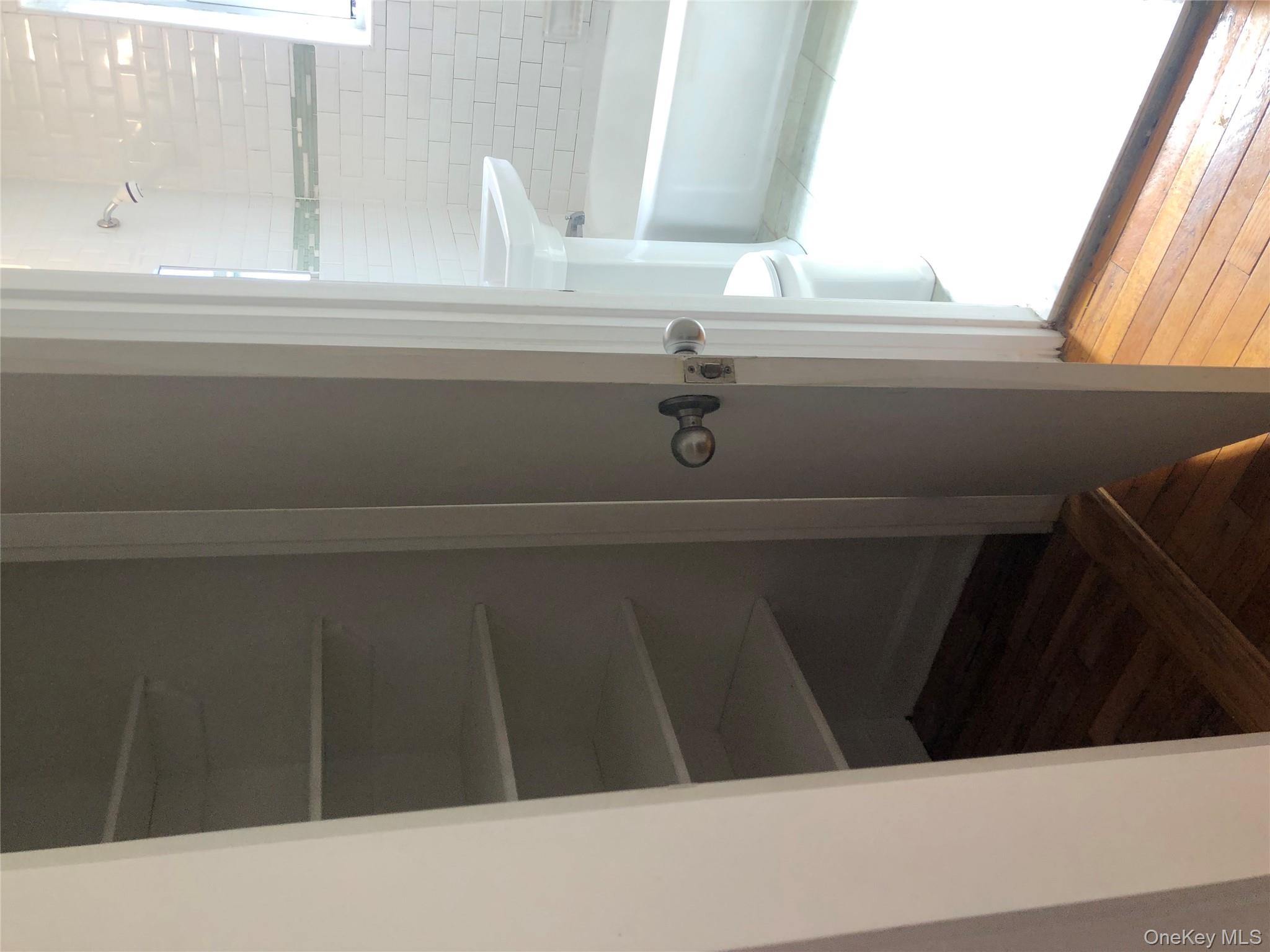 66-33 Yellowstone Boulevard, Unit 2B Queens, NY 11375 - Photo 9 of 13 a bathroom with a tub