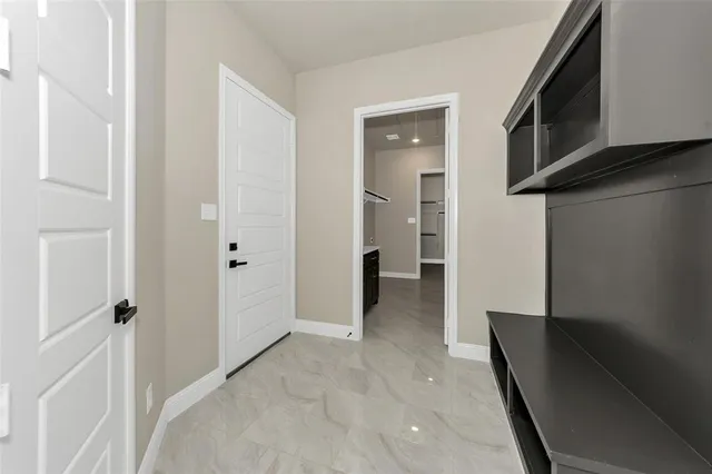 a view of an empty walk in closet