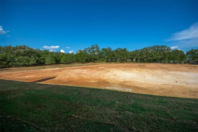 a view of yard and ocean view