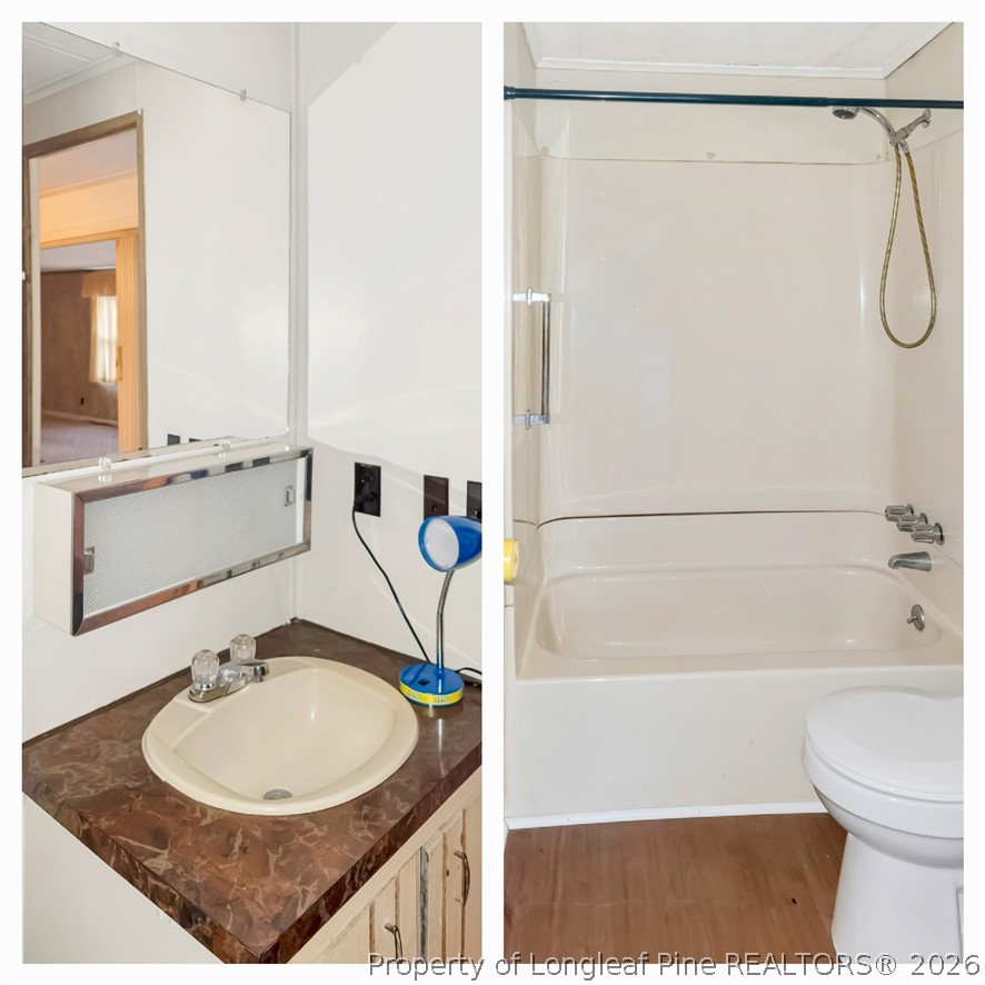 727 Rice Road Lumberton, NC 28358 - Photo 24 of 30 a bathroom with a sink toilet and shower