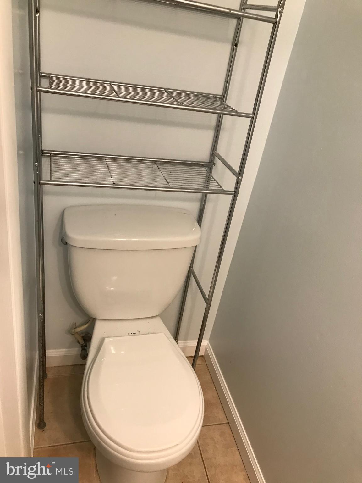 8317 Brookvale Court Springfield, VA 22153 - Photo 14 of 15 a close view of a toilet in bathroom