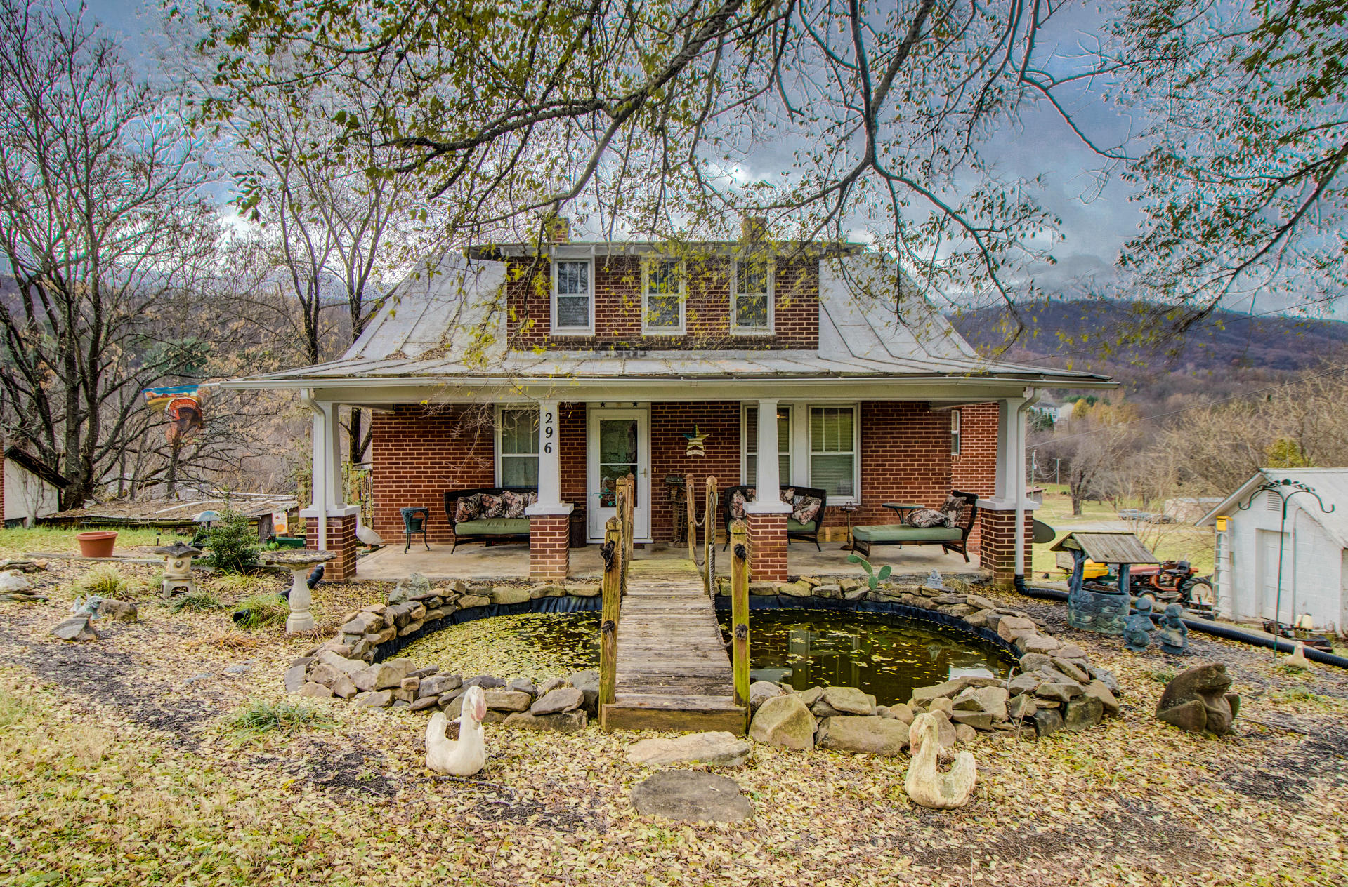 296 Archway Road Blue Ridge, VA 24064 - Photo 1 of 28 a front view of house with outdoor seating