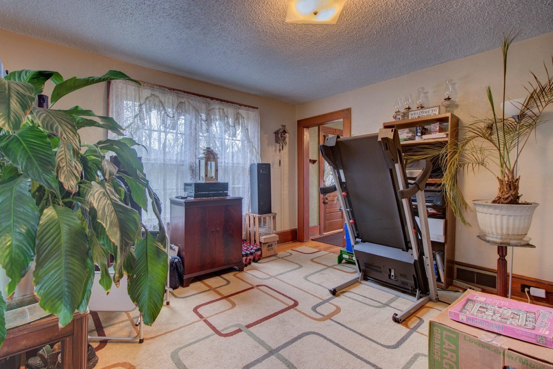 296 Archway Road Blue Ridge, VA 24064 - Photo 5 of 28 a view of a room with gym equipment