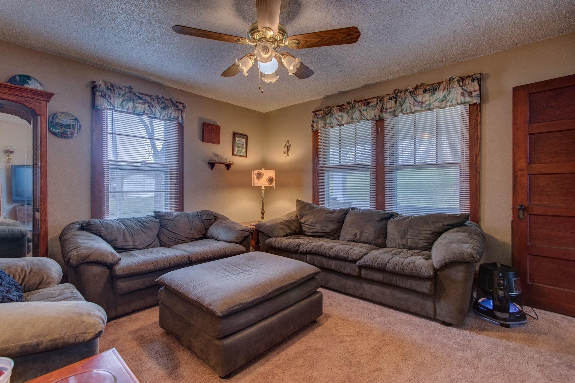 296 Archway Road Blue Ridge, VA 24064 - Photo 6 of 28 a living room with furniture and a large window