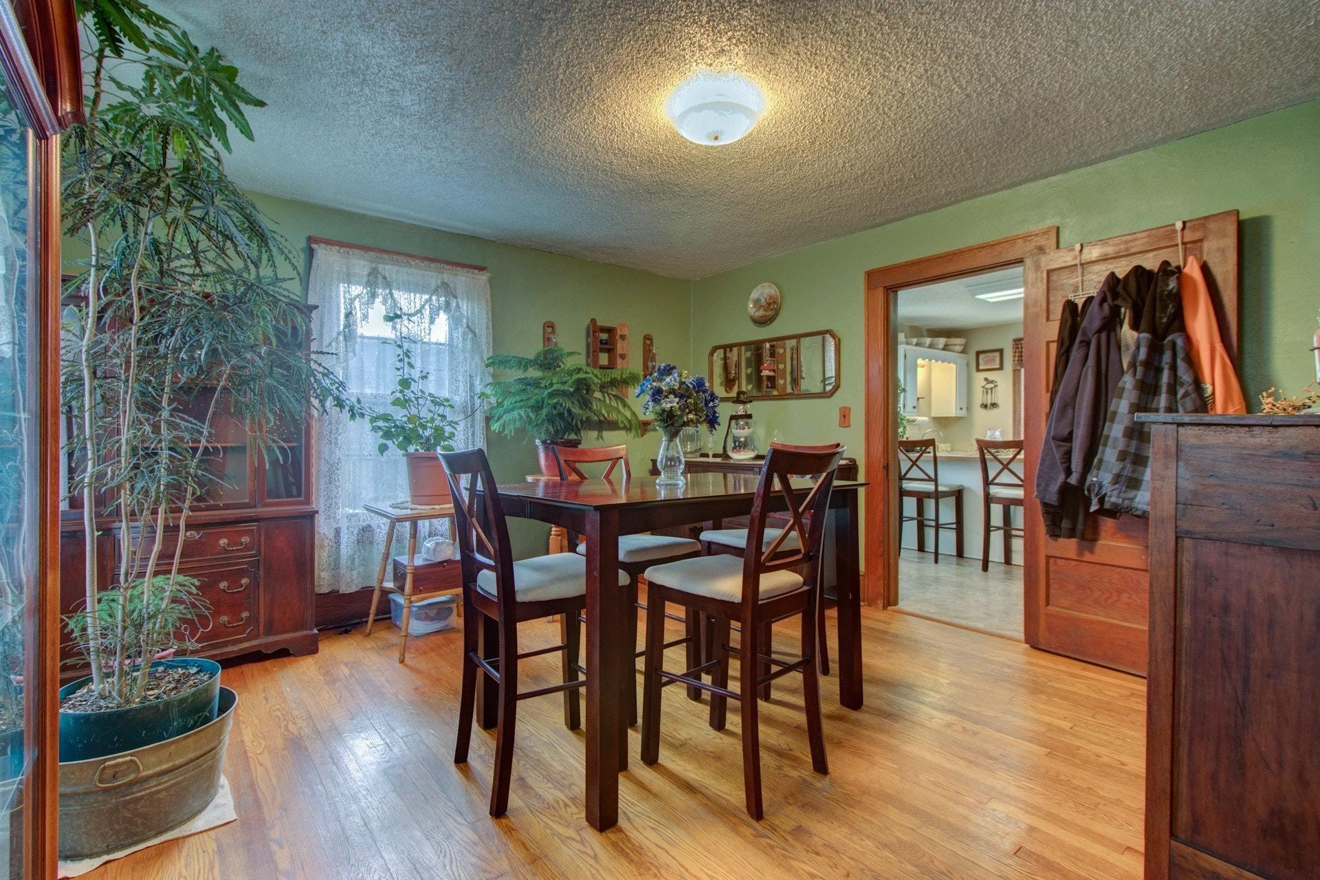 296 Archway Road Blue Ridge, VA 24064 - Photo 9 of 28 a dining room with furniture and wooden floor