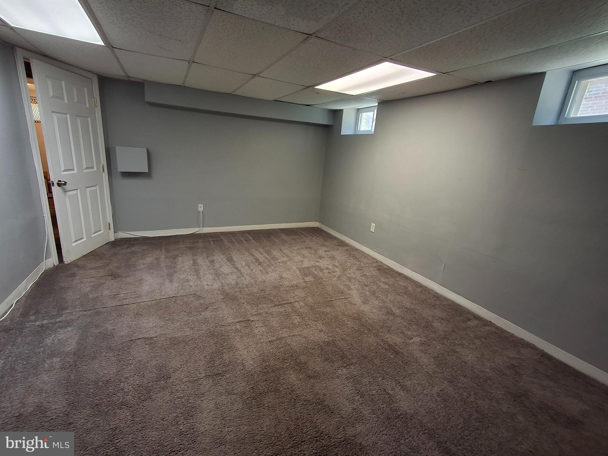 3906 Rosecrest Avenue Baltimore, MD 21215 - Photo 16 of 23 a view of an empty room with a window
