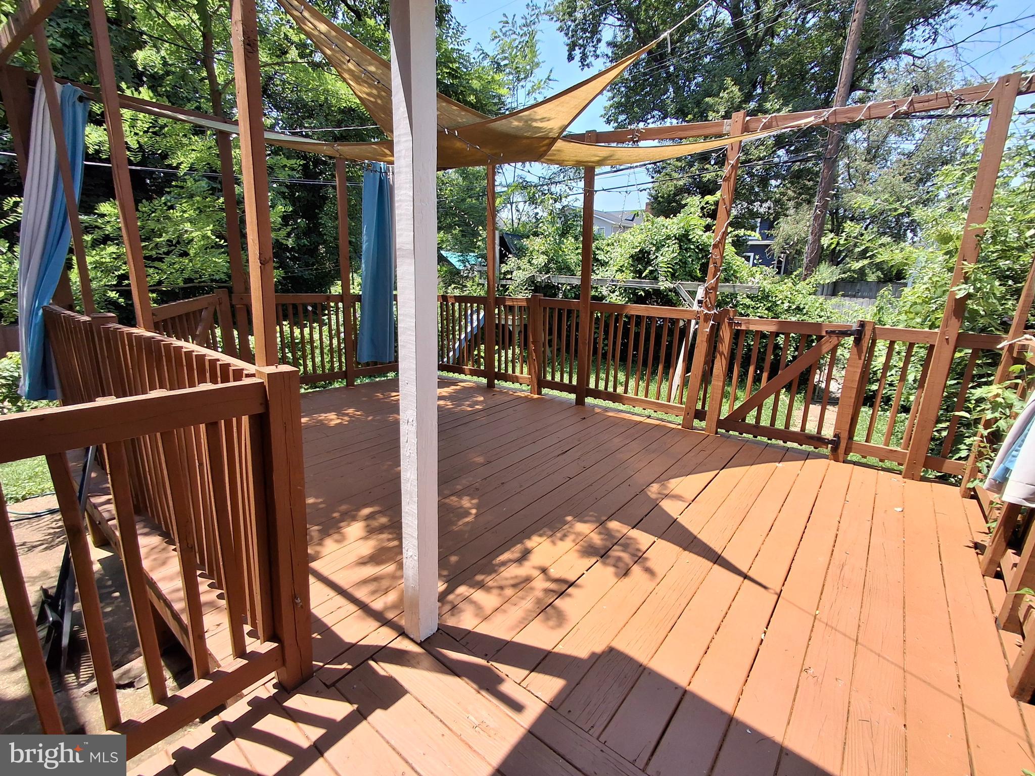 3906 Rosecrest Avenue Baltimore, MD 21215 - Photo 19 of 23 a view of balcony with wooden floor and outdoor seating