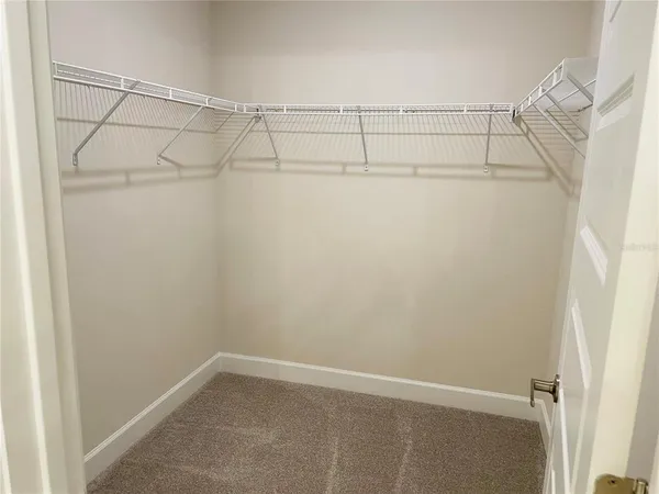 a view of a room with racks on the wall
