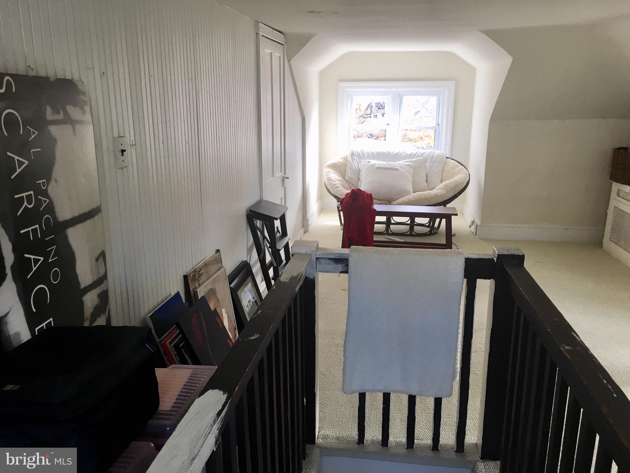 3704 Chatham Road Baltimore, MD 21215 - Photo 20 of 28 a view of a workspace with furniture and a window