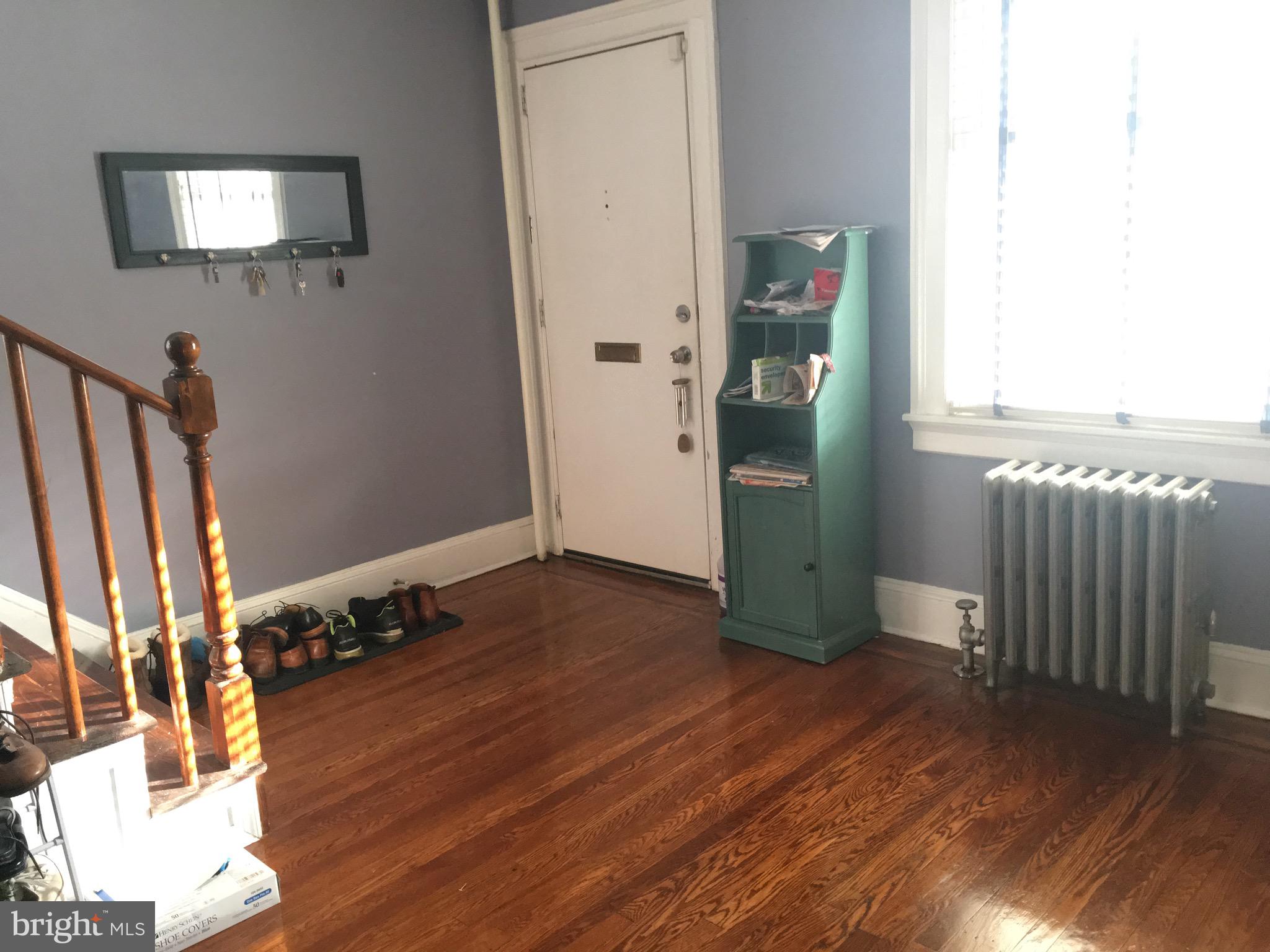 3704 Chatham Road Baltimore, MD 21215 - Photo 3 of 28 a view of a livingroom with wooden floor