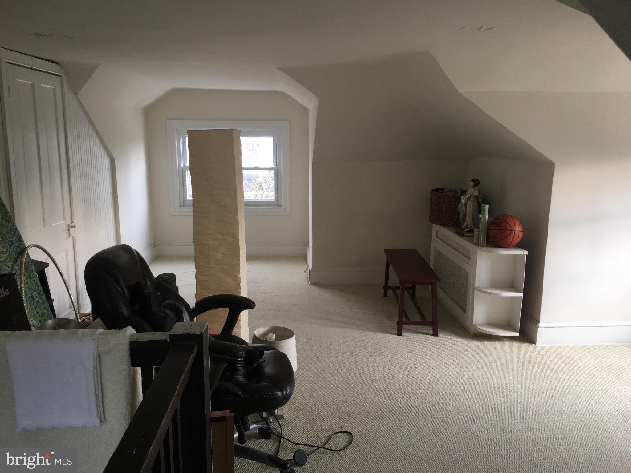3704 Chatham Road Baltimore, MD 21215 - Photo 24 of 28 a room with furniture and gym equipment