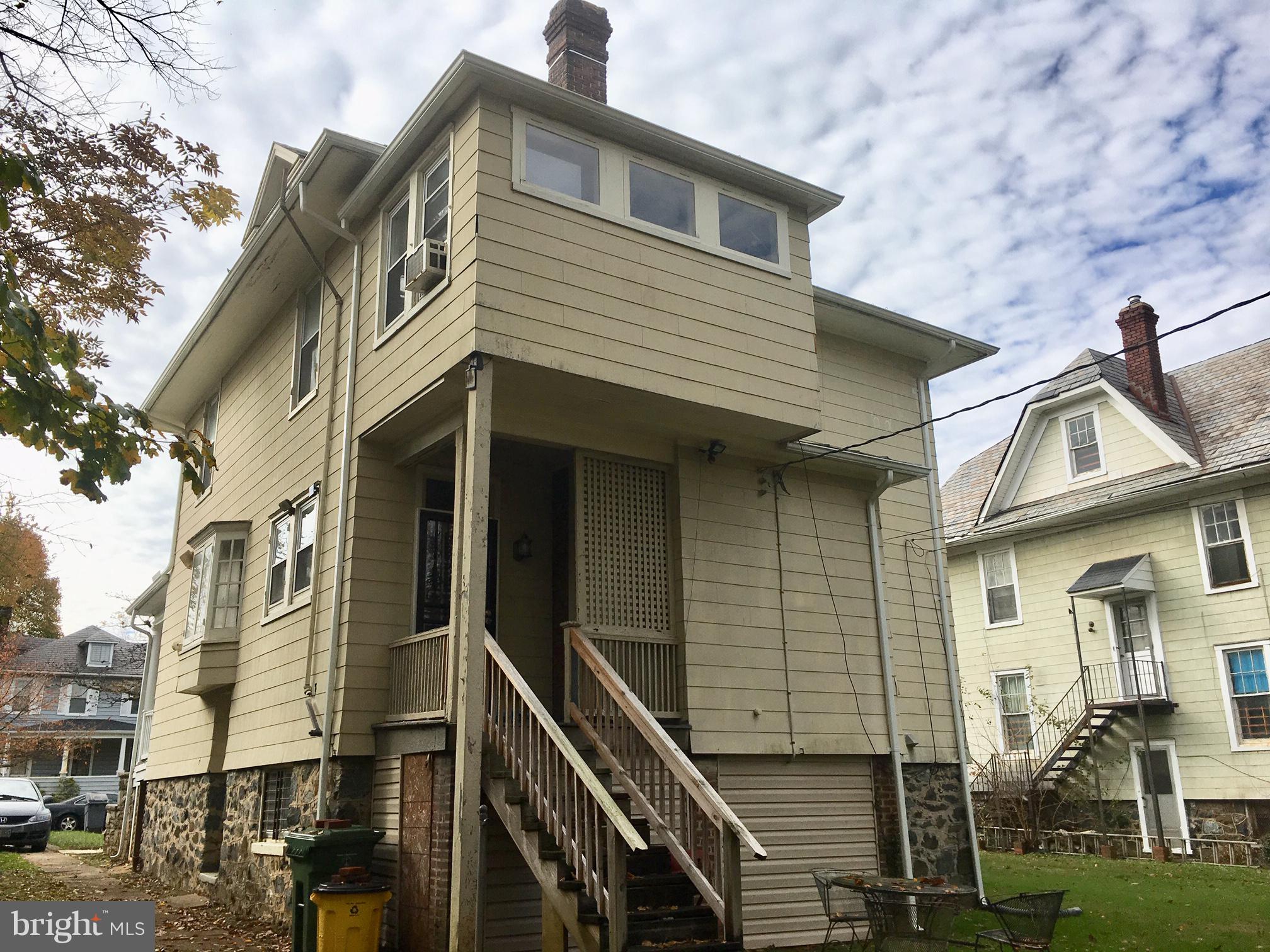 3704 Chatham Road Baltimore, MD 21215 - Photo 25 of 28 a view of a house with many windows