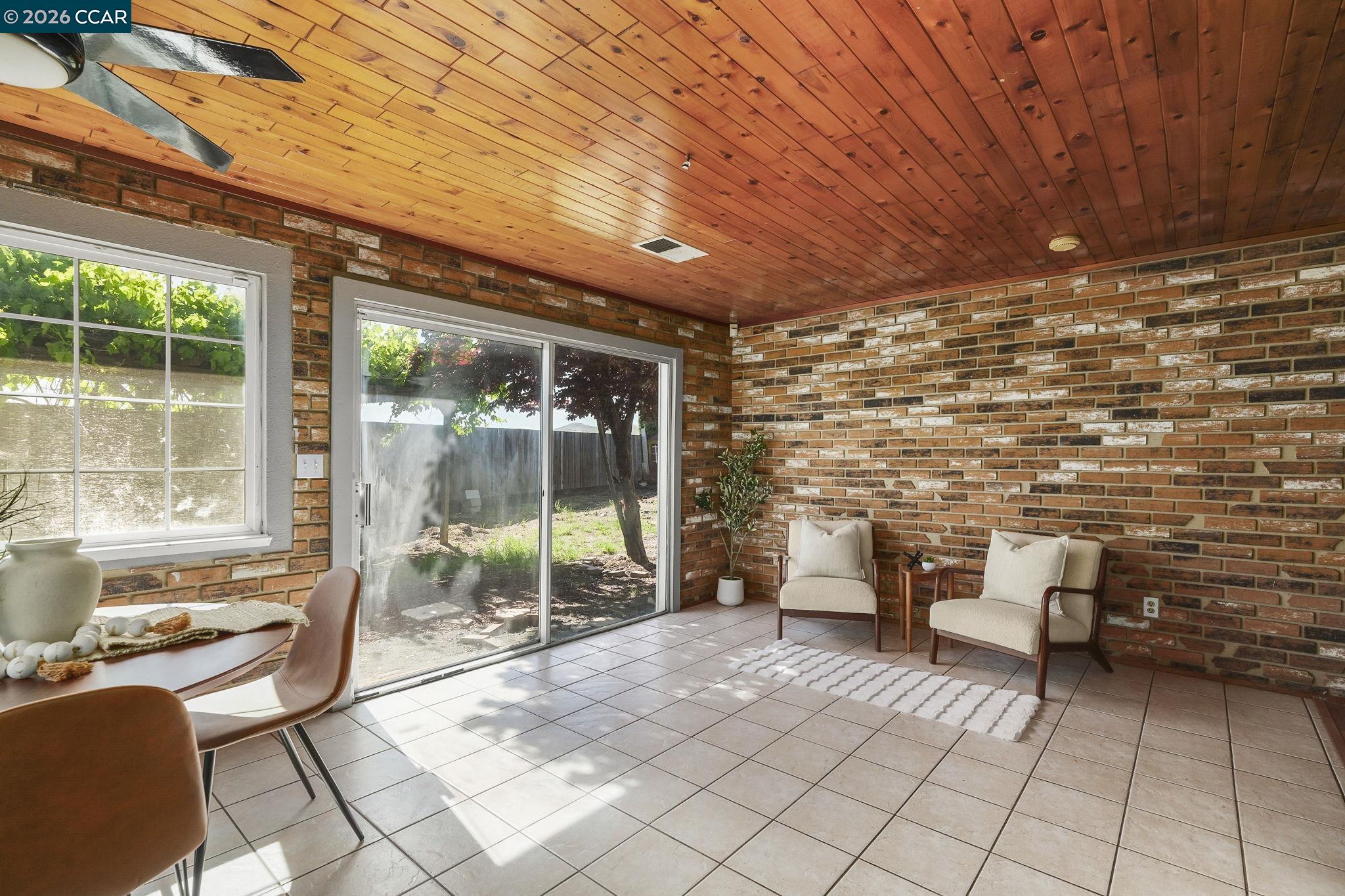 476 Pamela Drive Bay Point, CA 94565 - Photo 10 of 24 a view of a patio with table and chairs and potted plants