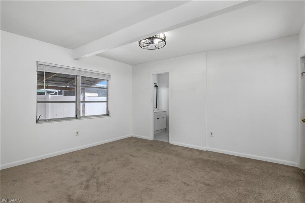 48 Republic Drive Naples, FL 34112 - Photo 11 of 29 Main suite with en-suite bath