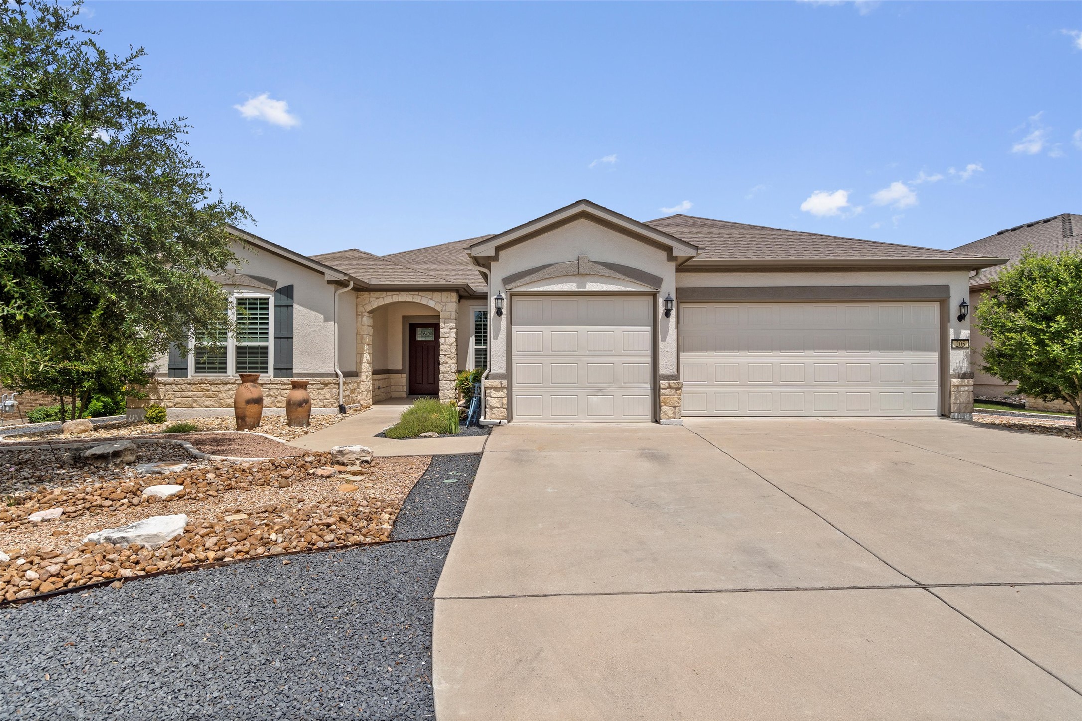 205 McKittrick Ridge Road Georgetown, TX 78633 - Photo 3 of 37 a view of garage and yard