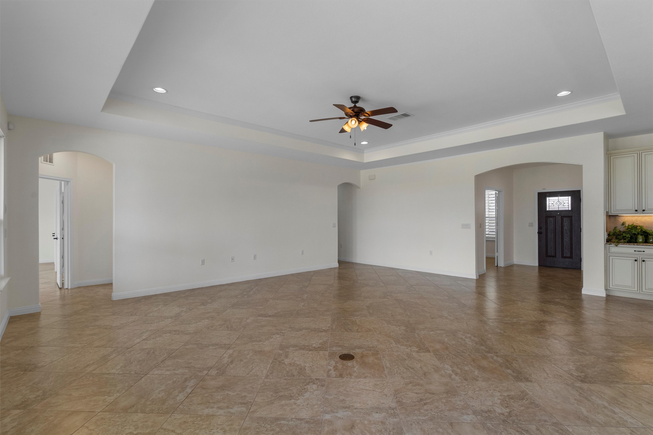 205 McKittrick Ridge Road Georgetown, TX 78633 - Photo 5 of 37 wooden floor in an empty room with a window