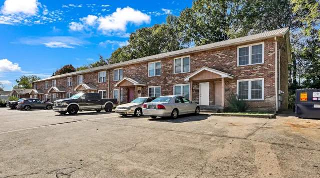 a car parked in front of a house