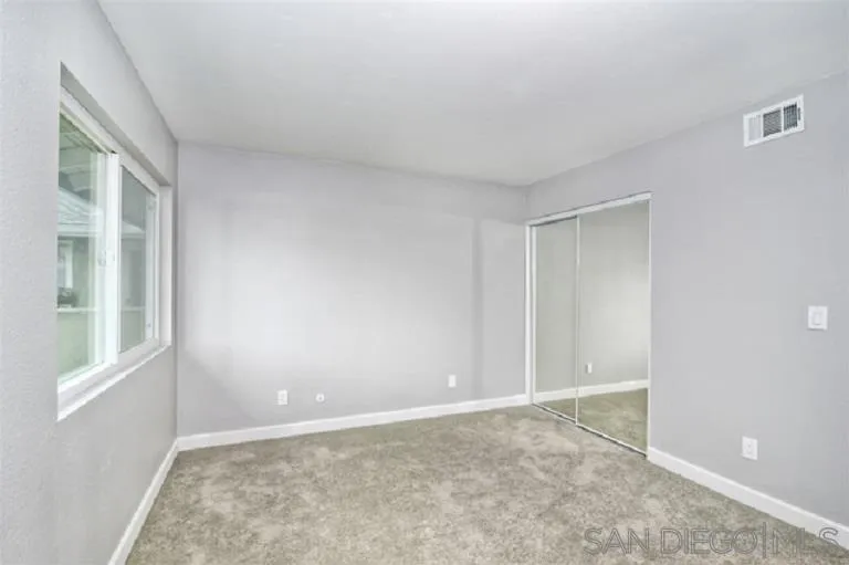 2520 Wanek Road, Unit B Escondido, CA 92027 - Photo 8 of 12 a view of an empty room with a window
