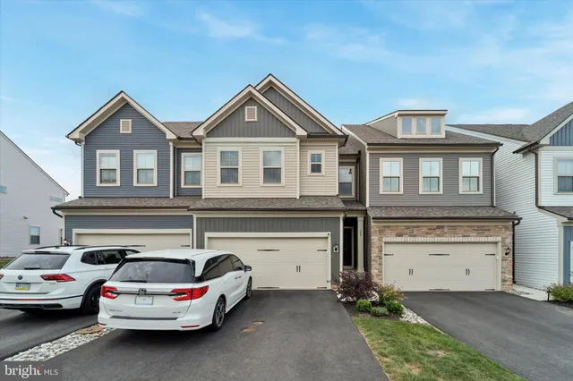 a car parked in front of a house