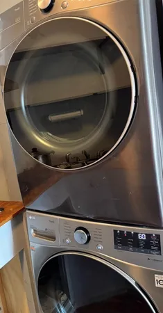 a utility room with washing machine