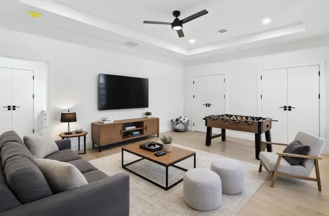 a spacious bedroom with a bed and a couch