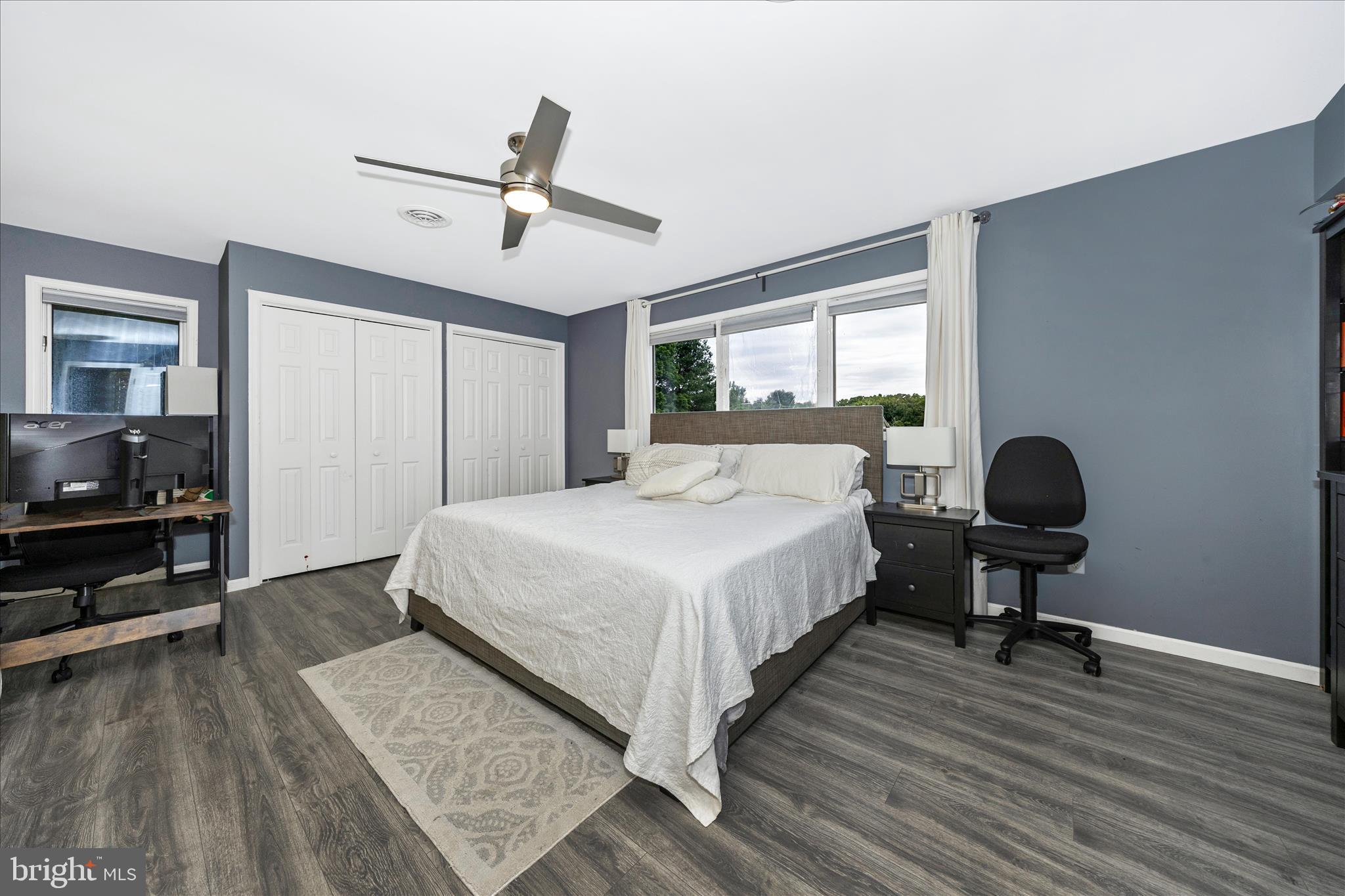 15749 Spade Road Hagerstown, MD 21740 - Photo 20 of 23 a bedroom with a bed and wooden floor