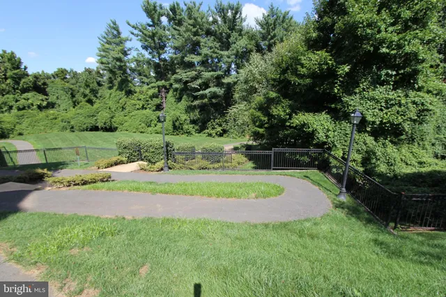 a view of backyard with green space
