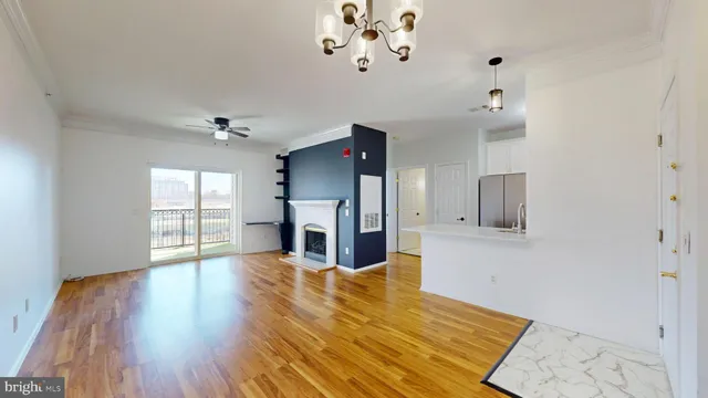 a view of a livingroom with wooden floor
