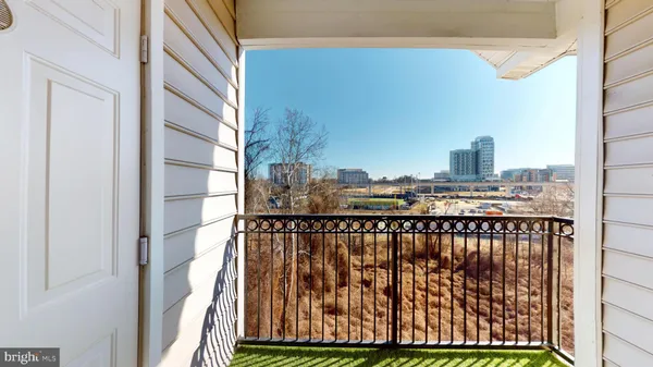 a view of balcony with furniture