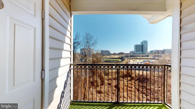 a view of balcony with furniture