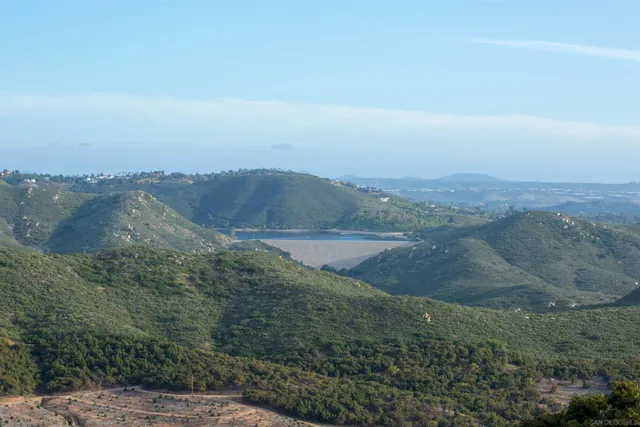 a view of a lake from a balcony
