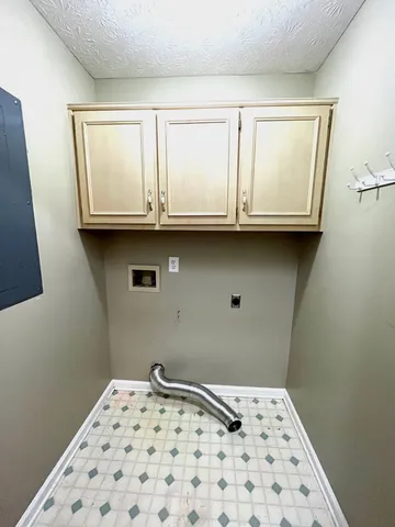 a front view of a house with a large window