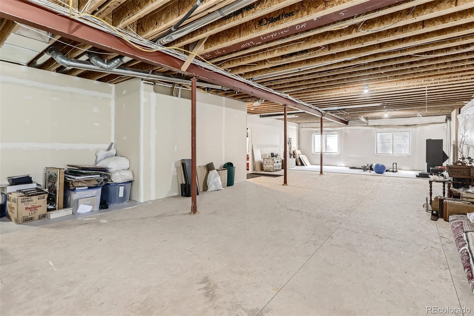 10189 Longview Drive Lone Tree, CO 80124 - Photo 32 of 40 a view of a room with gym equipment
