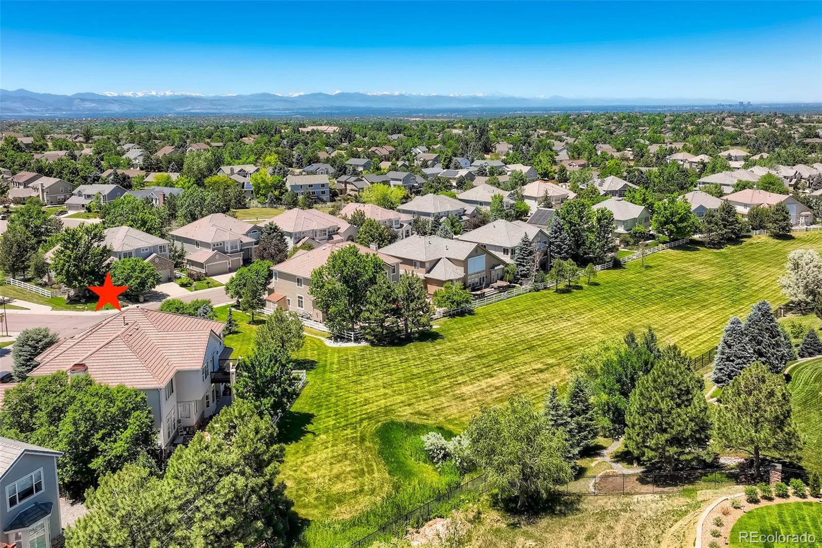 10189 Longview Drive Lone Tree, CO 80124 - Photo 40 of 40 an aerial view of residential houses with outdoor space and trees