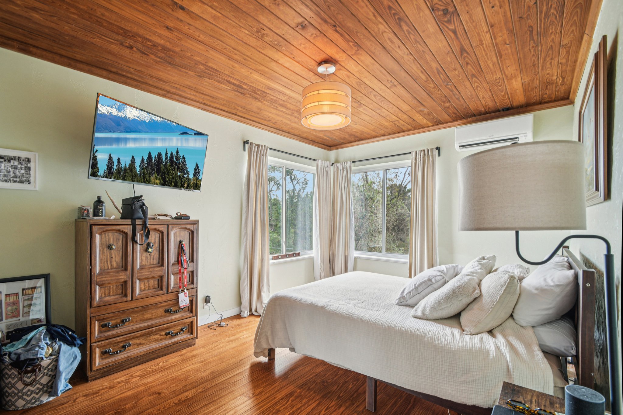 2108 River Hills Road Austin, TX 78733 - Photo 12 of 35 a bedroom with furniture and wooden floor
