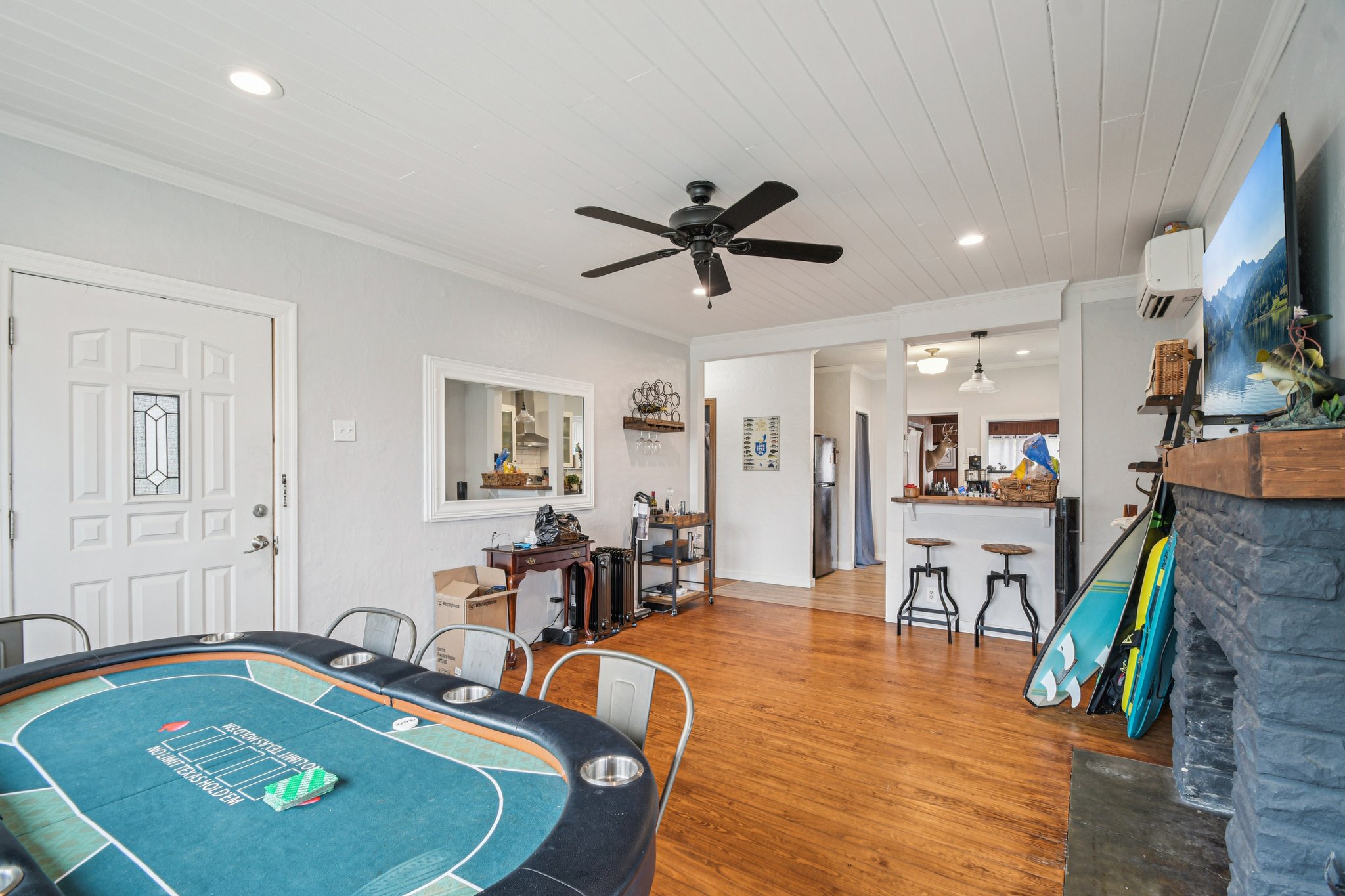 2108 River Hills Road Austin, TX 78733 - Photo 16 of 35 a living room with furniture and a wooden floor