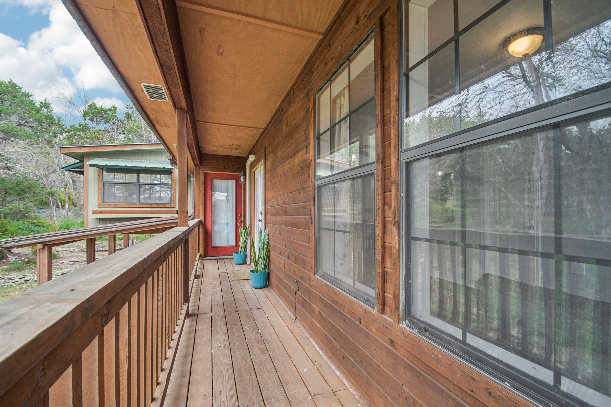 2108 River Hills Road Austin, TX 78733 - Photo 18 of 35 a view of balcony with wooden floor