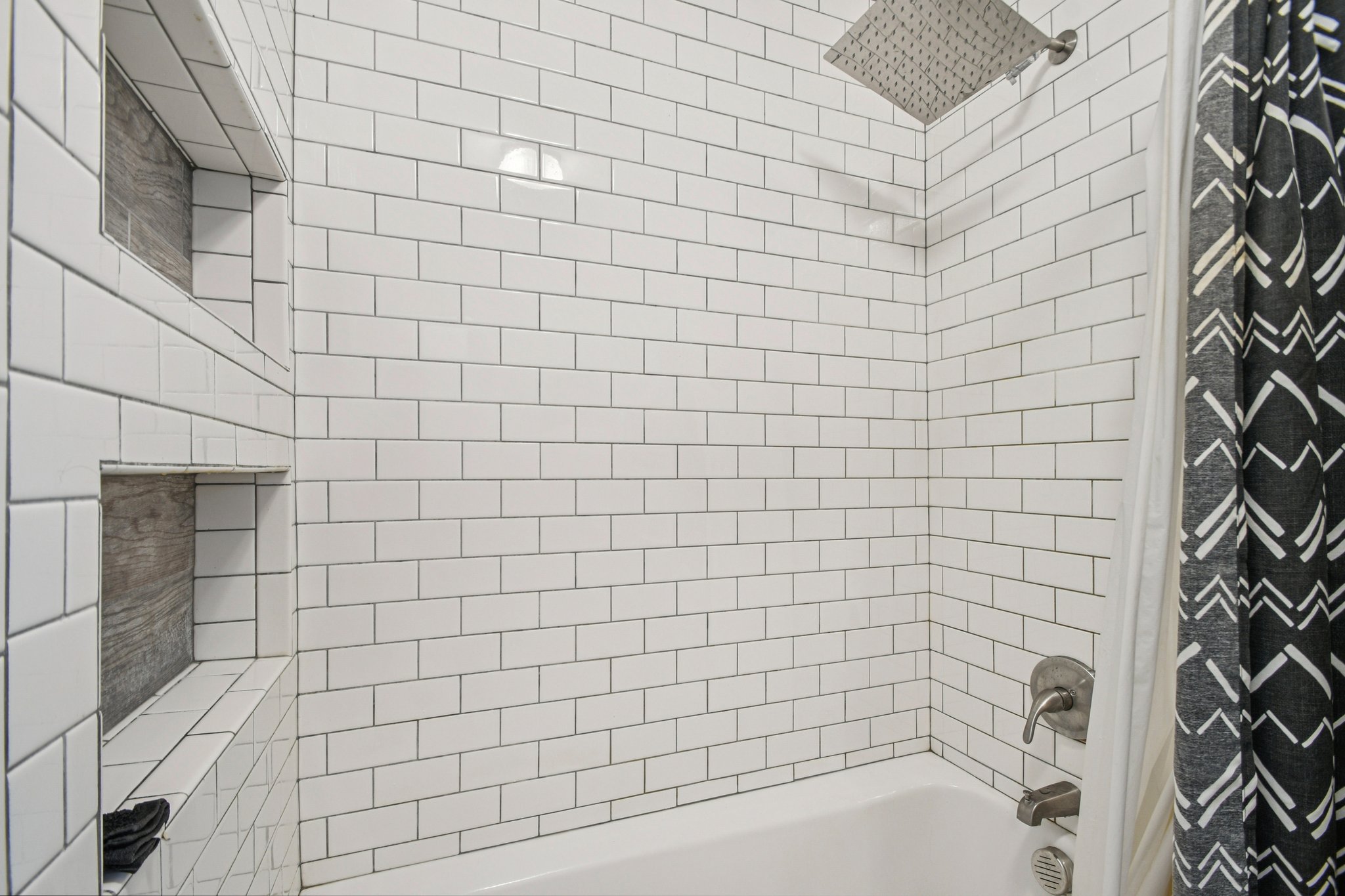 2108 River Hills Road Austin, TX 78733 - Photo 25 of 35 a bathroom with a bathtub and shower