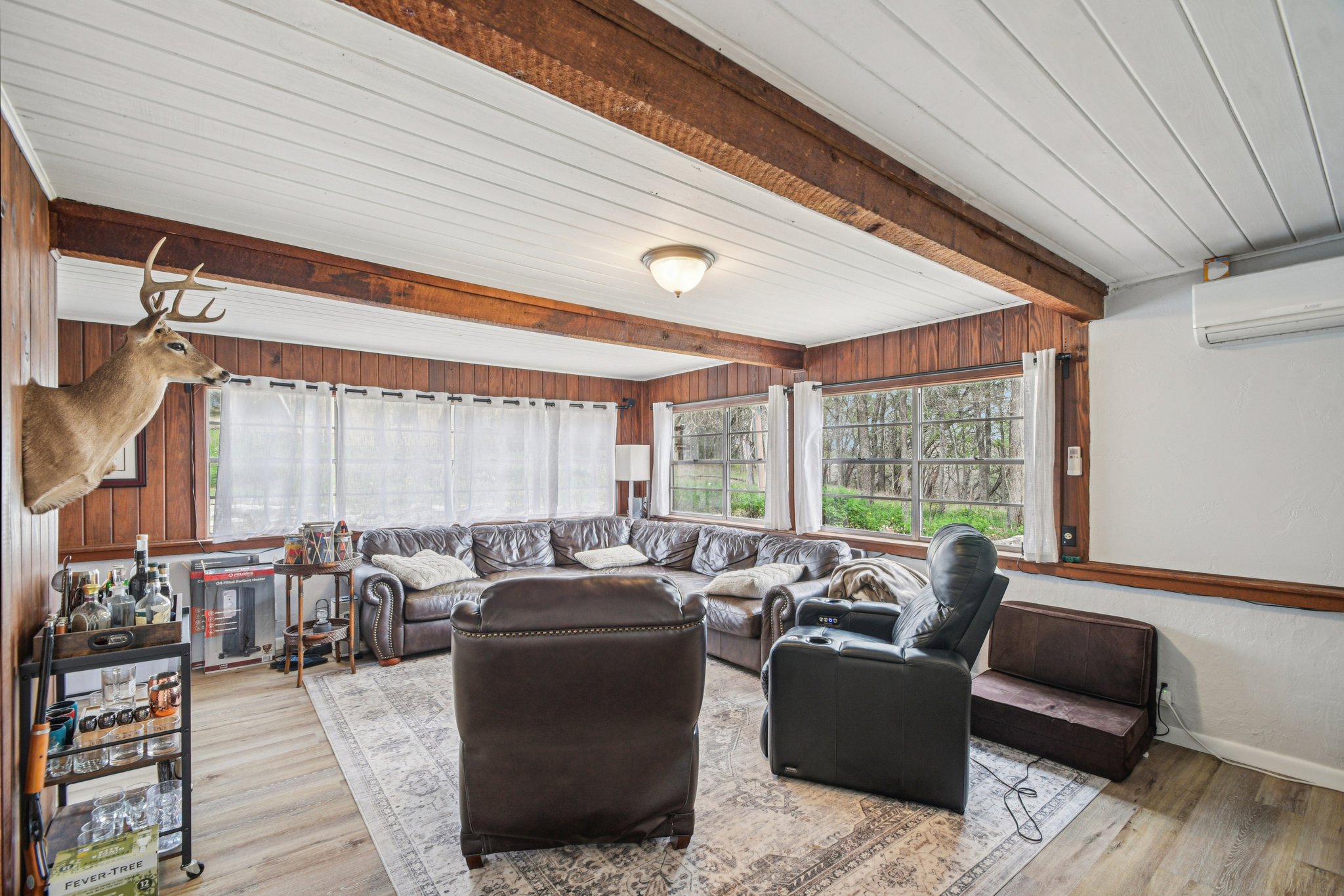 2108 River Hills Road Austin, TX 78733 - Photo 7 of 35 a living room with furniture and a large window
