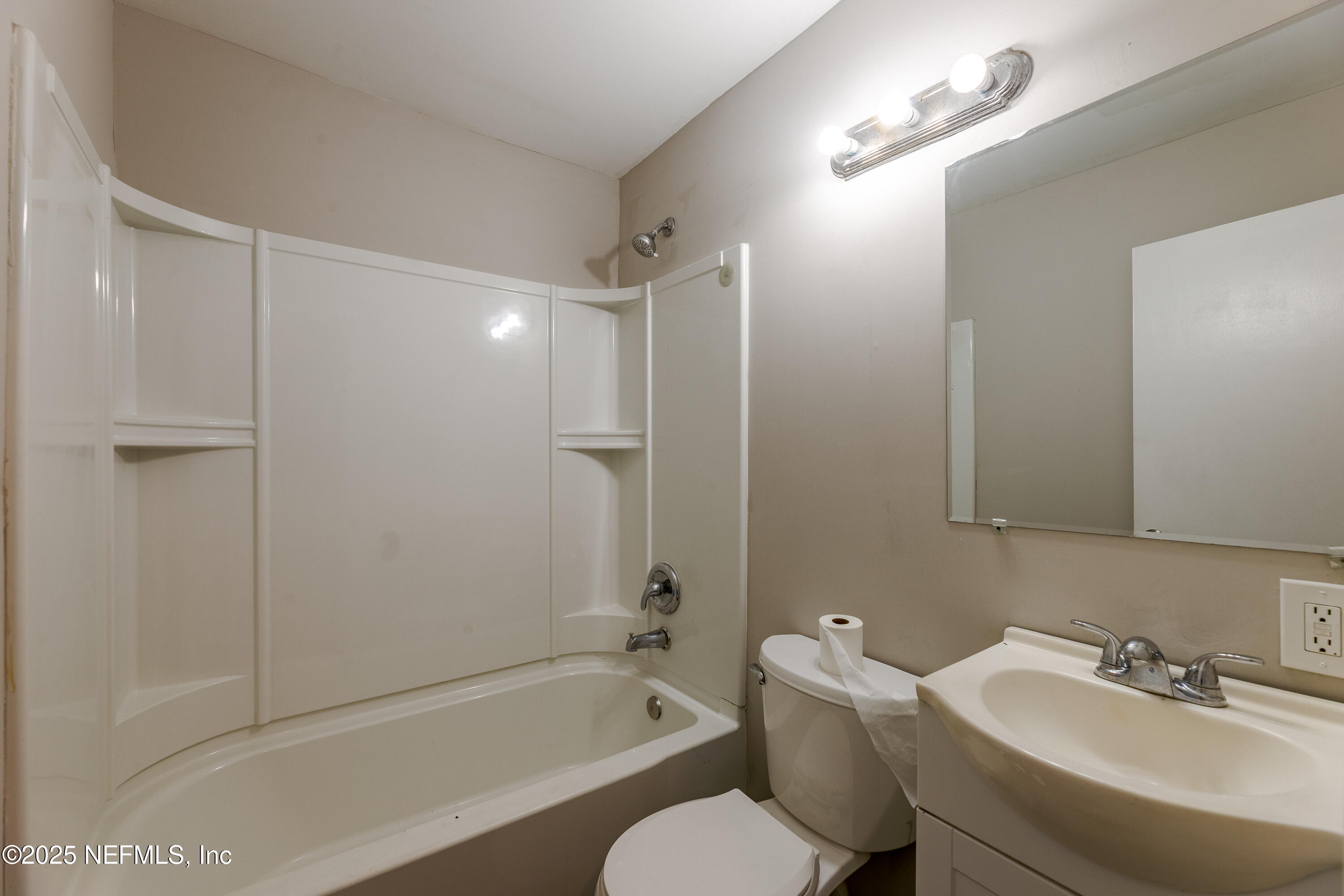 2387 2nd Avenue Jacksonville, FL 32208 - Photo 12 of 20 a bathroom with a bathtub shower sink vanity and a toilet