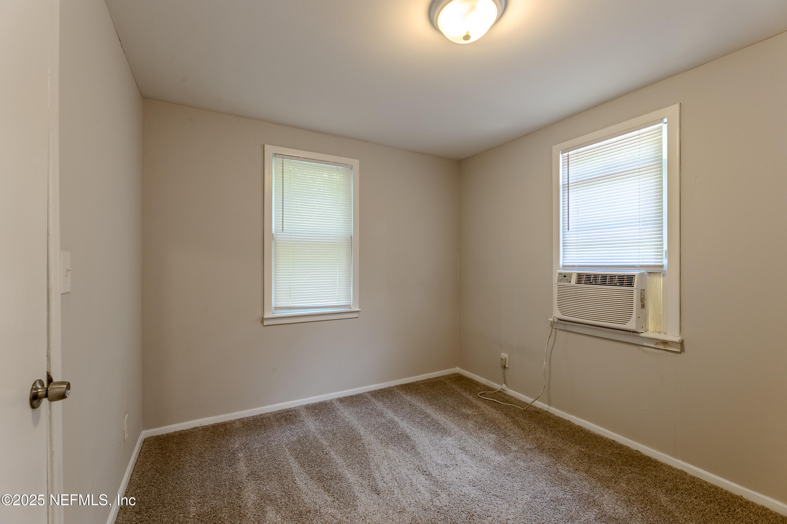 2387 2nd Avenue Jacksonville, FL 32208 - Photo 13 of 20 an empty room with a window