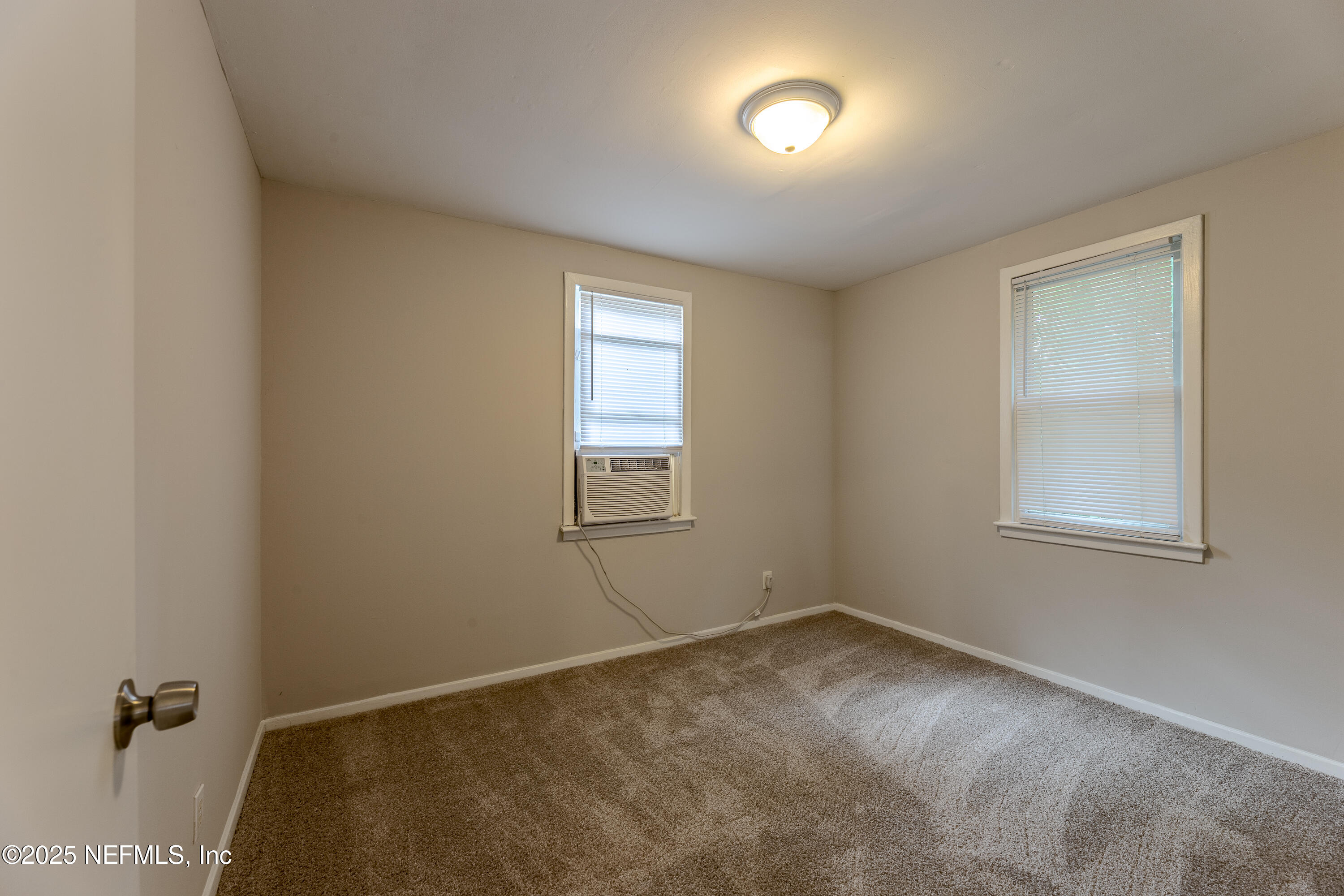 2387 2nd Avenue Jacksonville, FL 32208 - Photo 15 of 20 an empty room with windows
