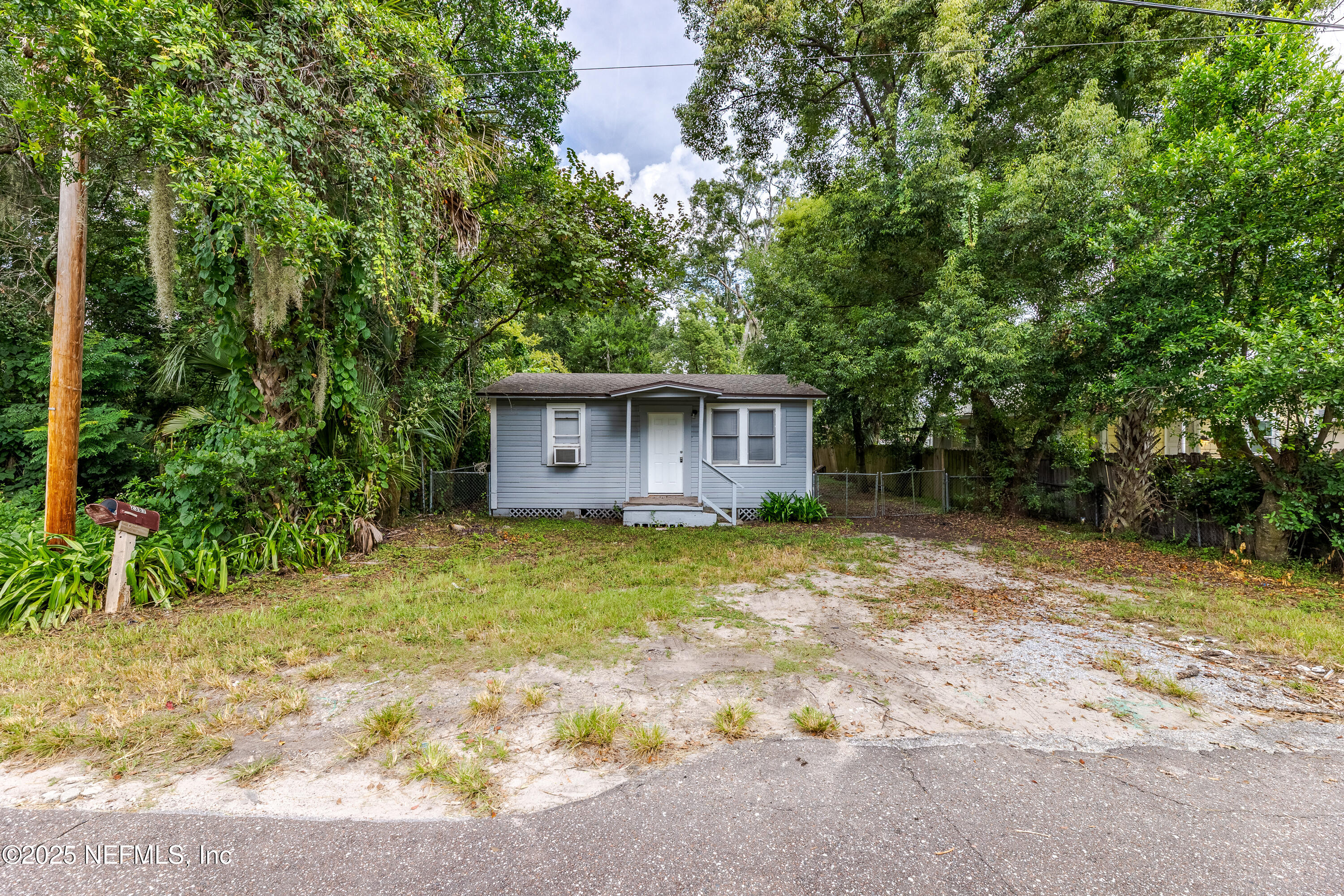 2387 2nd Avenue Jacksonville, FL 32208 - Photo 2 of 20 a view of a house with yard and a tree